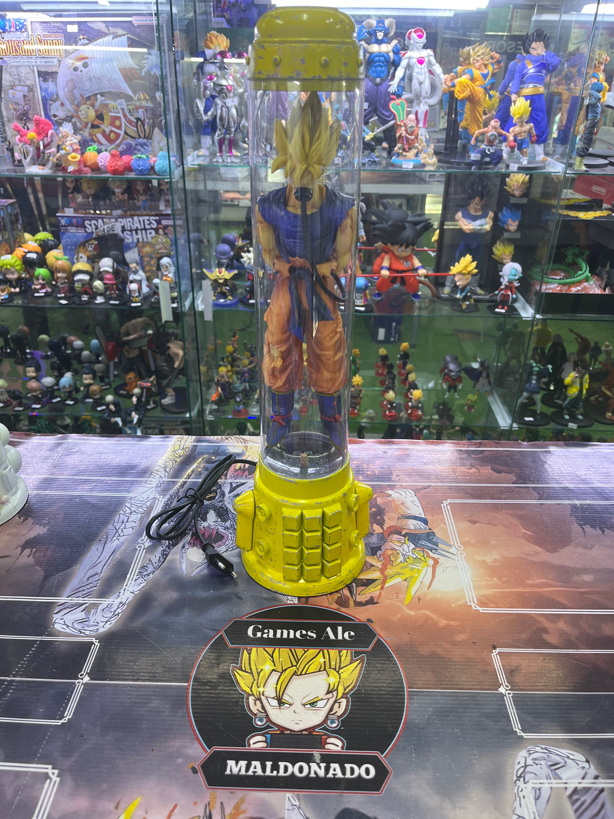 CÁPSULA DE RECUPERACIÓN GOKU SUPER SAYAN EXCLSUIVA GAMES ALE ( DRAGON BALL Z )