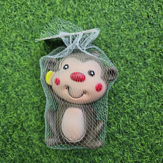 MUÑECO MONO DE GOMA CON CHIFLE