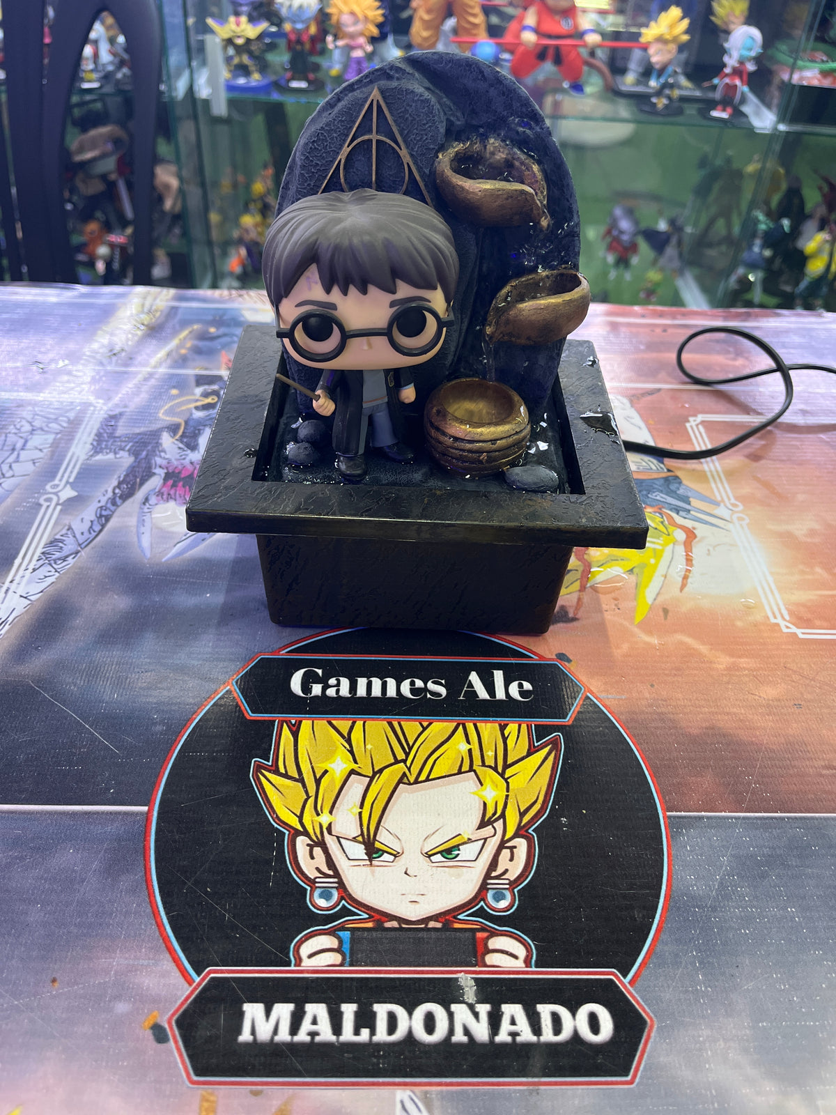 FUENTE DECORATIVA HARRY POTTER ARTESANAL CON FIGURA OFICIAL ( HARRY )
